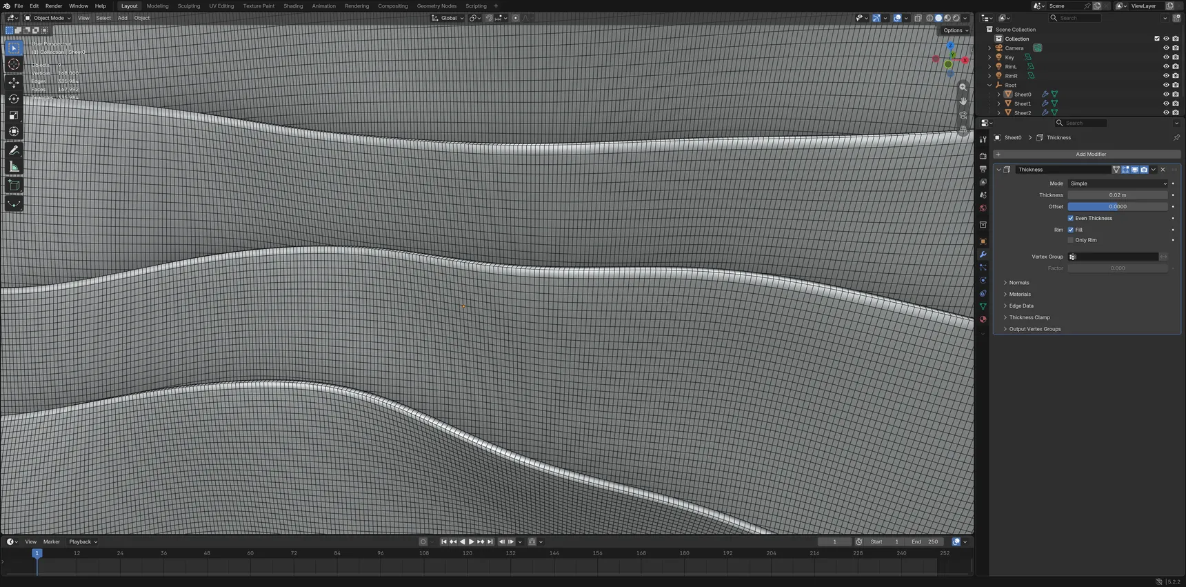 Close-up of the four curved sheets in Blender, with dense wireframe grids following their surfaces.